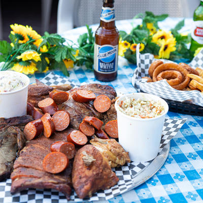 Mixed meat platter, served with coleslaw.