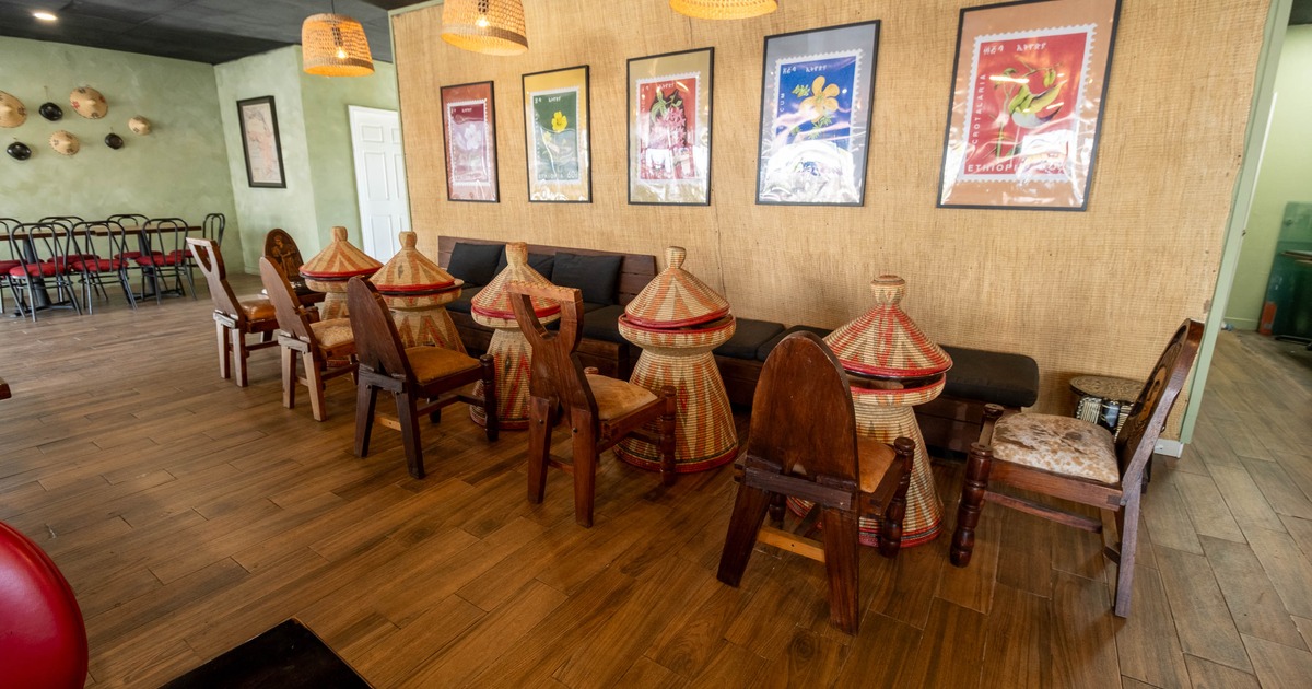 Interior, seating place near wall with pictures