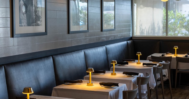 Long seating booth, tables and chairs