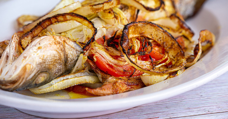 Fish served with grilled vegetables