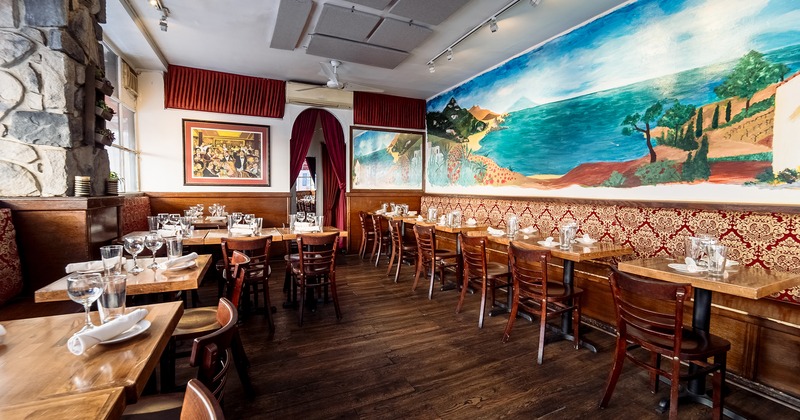 Restaurant interior, dining area with set tables