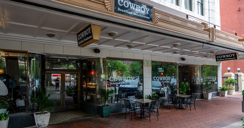 Outdoor seating area in front of the restaurant's entrance