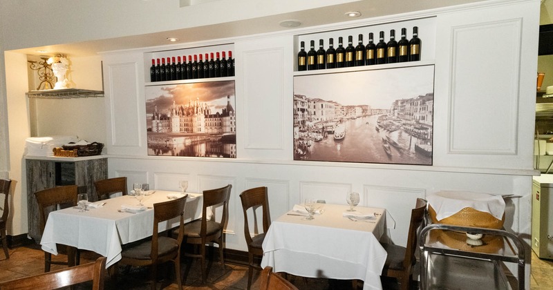 Interior, set tables and chairs ready for guests