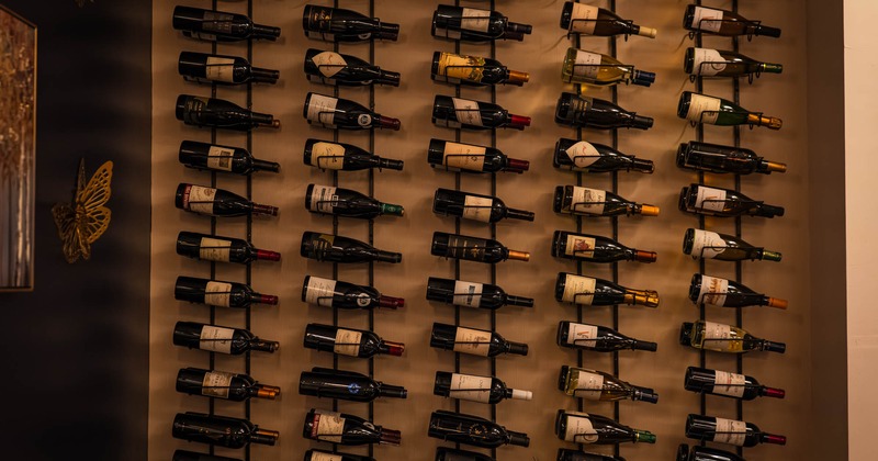 Wall display of assorted wine bottles