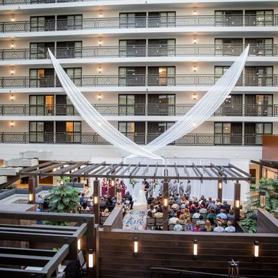 Wedding ceremony held in the indoor atrium
