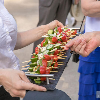 Guests tasting grilled vegetables