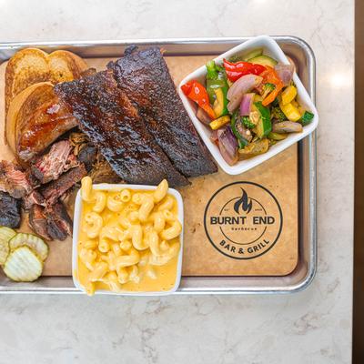 BBQ ribs, with toast, mac and cheese, and salad.