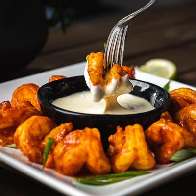 Shrimp with a creamy cheese dip.