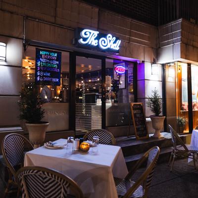 Night shot of set outdoor seating area.