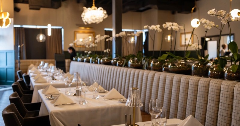Seating area with booths and chairs, luxurious ambient
