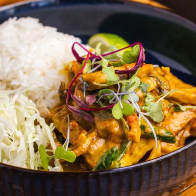 Rice bowl with chicken and veggies.
