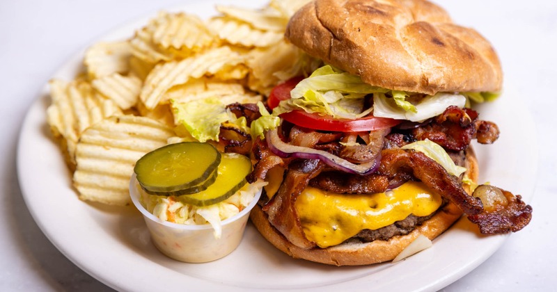 Bacon cheeseburger and potato chips