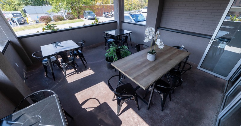 Covered patio, tables and chairs