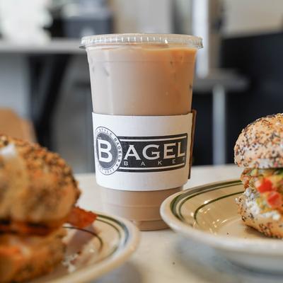 Sandwiches and coffee served on a table, close up.