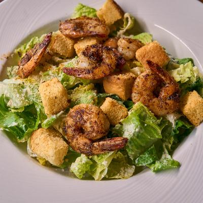 Caesar salad with blackened shrimp.