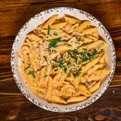 Penna pasta in pink vodka sauce.