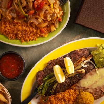 Carne La Padilla with side served alongside Presidents Chicken.