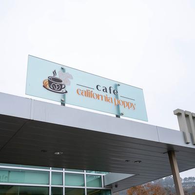 Cafe exterior, fascia sign.