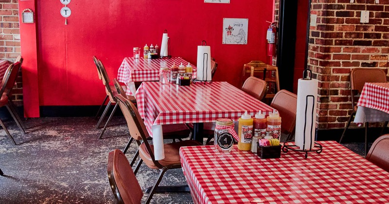 Interior, lined up tables ready for guests