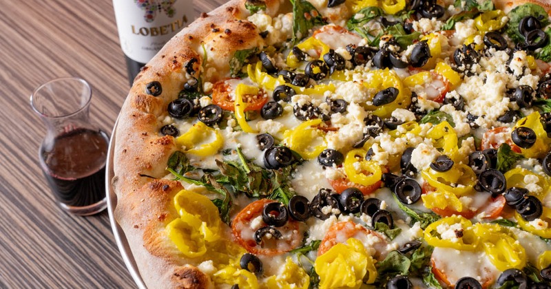 Mediterranean pizza, paired with red wine