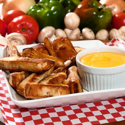 Pretzel dippers with cheese sauce.