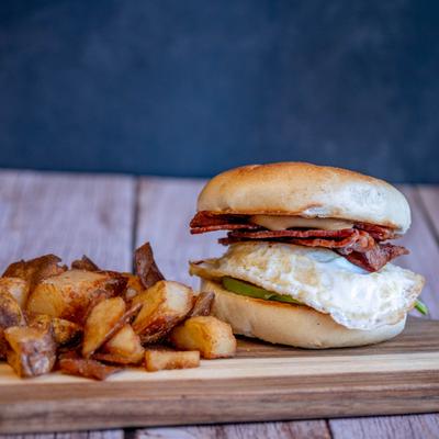 California Avocado Breakfast Bagel served with home fries.