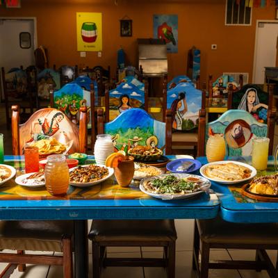Various food and drinks on the table.