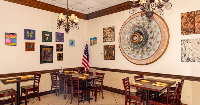 Interior, dining area with decor on the walls