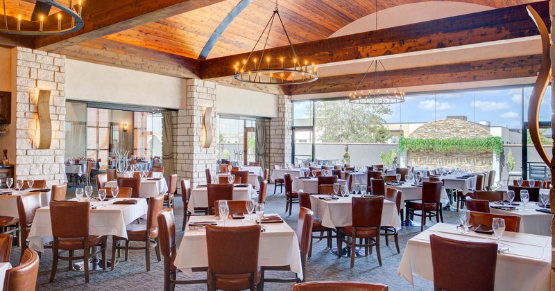 Interior, set tables ready to receive guests