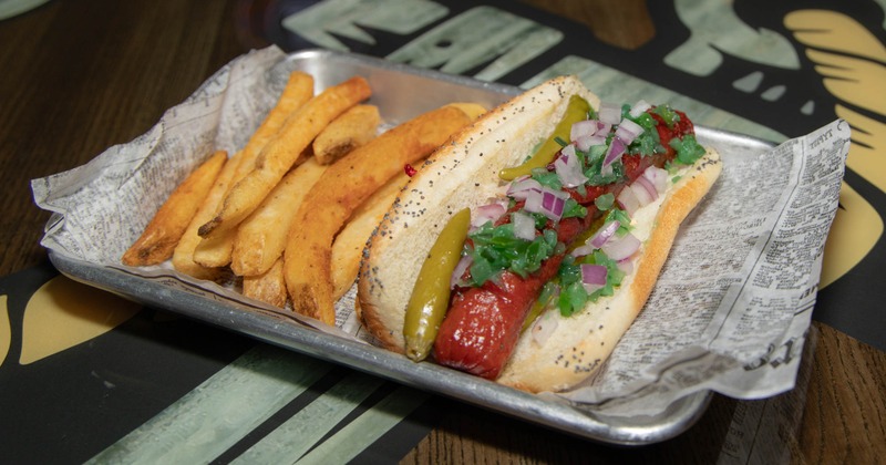 A Chicago-style hot dog with fries