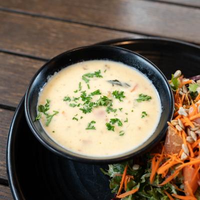 Soup and salad combo, closeup.