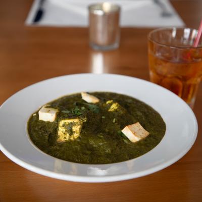 Cottage cheese cooked with baby spinach and ginger.