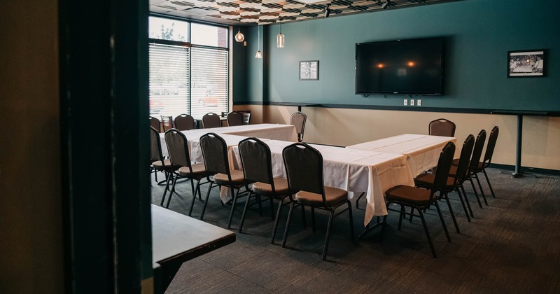 Interior, tables and chairs ready for guests