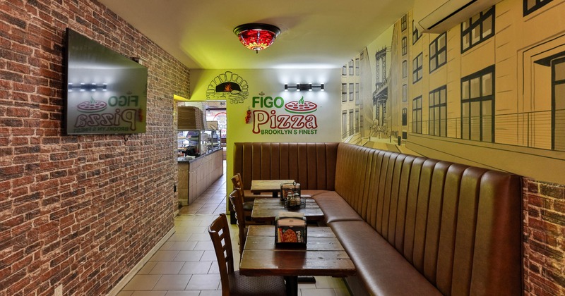 Interior, a long brown booth, wooden tables, and brick wall, mural, Figo pizza sign