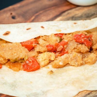 Burrito with pork rinds.