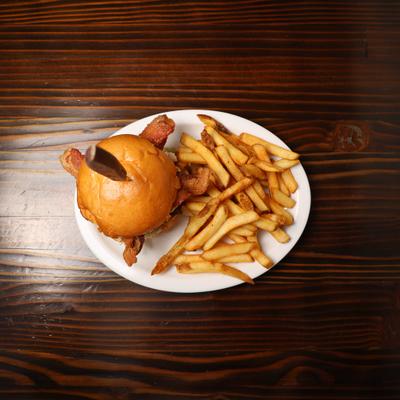 Bacon cheeseburger with fries.