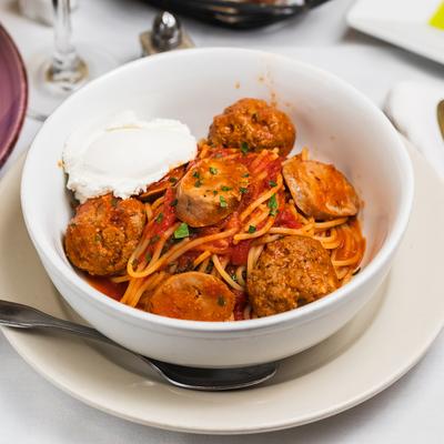 Spaghetti and meatballs with marinara.