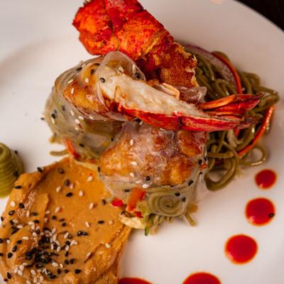 Lobster spring rolls with noodles.