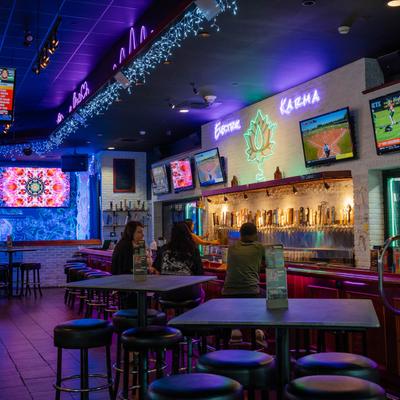 The restaurant's interior, tables and chairs.