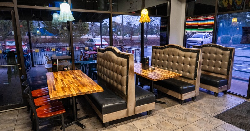Dining space with seating booths and chairs