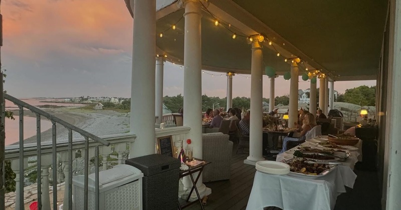 A buffet table displaying an assortment of food items at an outdoor event