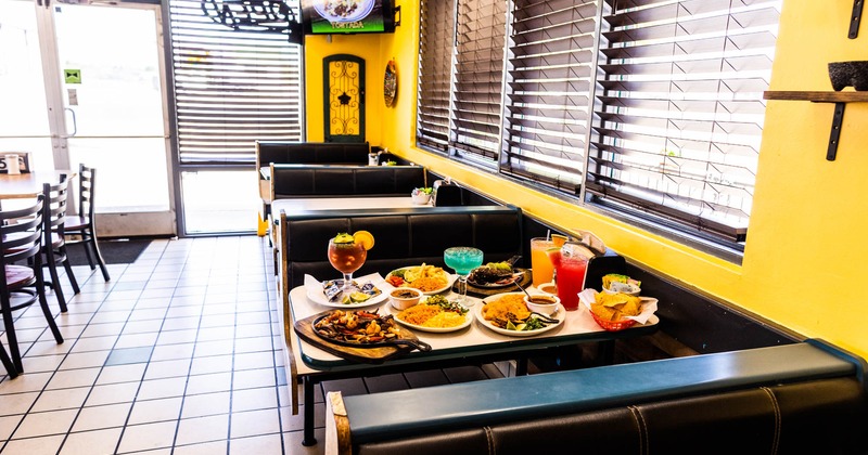 Interior, sitting booths, table with food plates