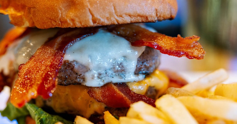 Triple Cheese Bacon Burger and fries