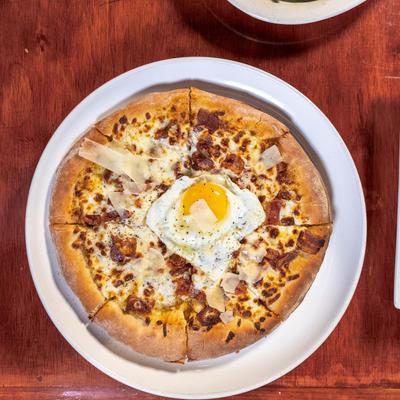 Pizza Carbonara, topped with a fried egg