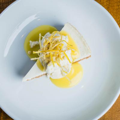 Plated Market Tavern cheesecake on white plate.