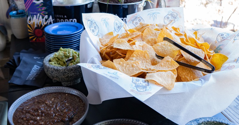 Tortilla chips, guacamole, and beans