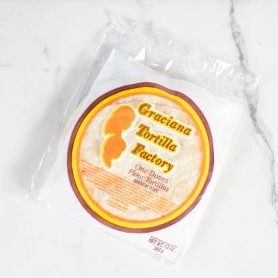 White corn tortillas in a sealed package.
