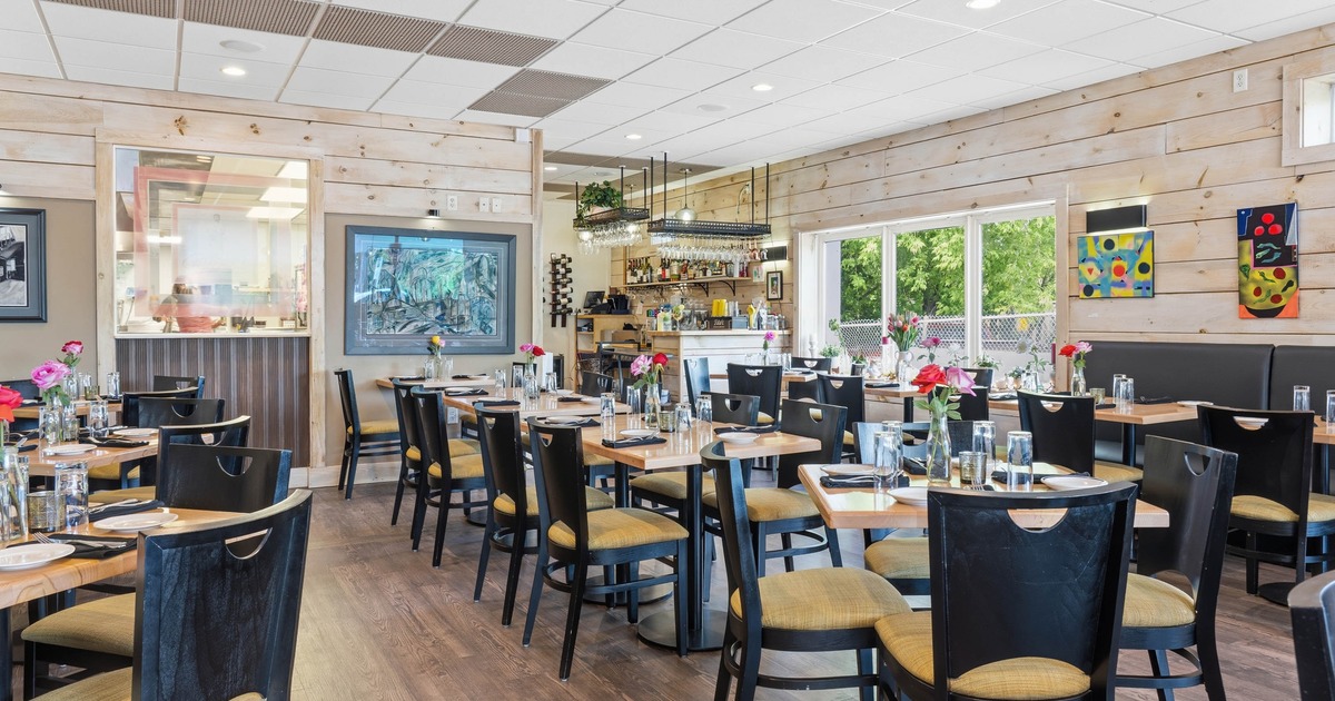 Bright dining room with tables and chairs