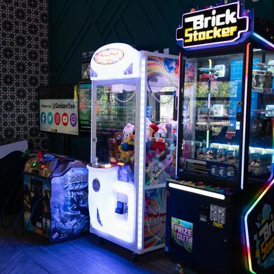Interior, brick stacker game machine, clow machine.