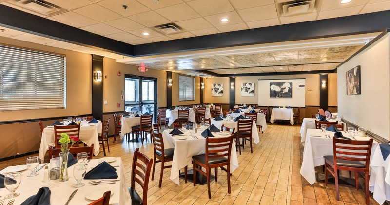 Interior, seating area with tables and chairs